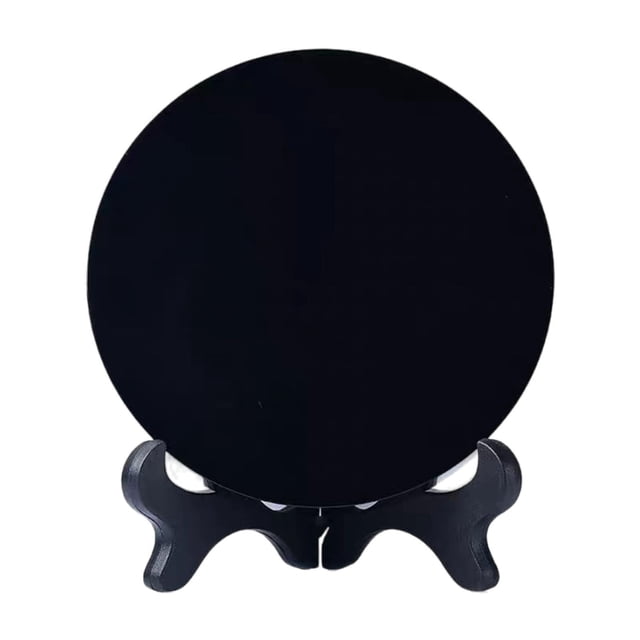 HILABEE Obsidian Circle Disc Obsidian Mirror, a black round mirror with a polished reflective surface, displayed on a black stand. Measuring 4cm in diameter, it is ideal for home or office decoration, fengshui, or as a scrying mirror and conversation starter.