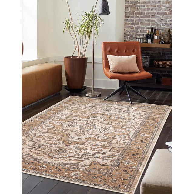 ECARPET Stassie Traditional Area Rug in beige, brown, and muted blue floral and medallion patterns on dark hardwood flooring, shown in a living room with a brown leather swivel chair with beige cushion, tall potted plant, modern floor lamp, and brick accent wall with wooden shelf holding bottles and decor, ideal for living rooms, bedrooms, or hallways.