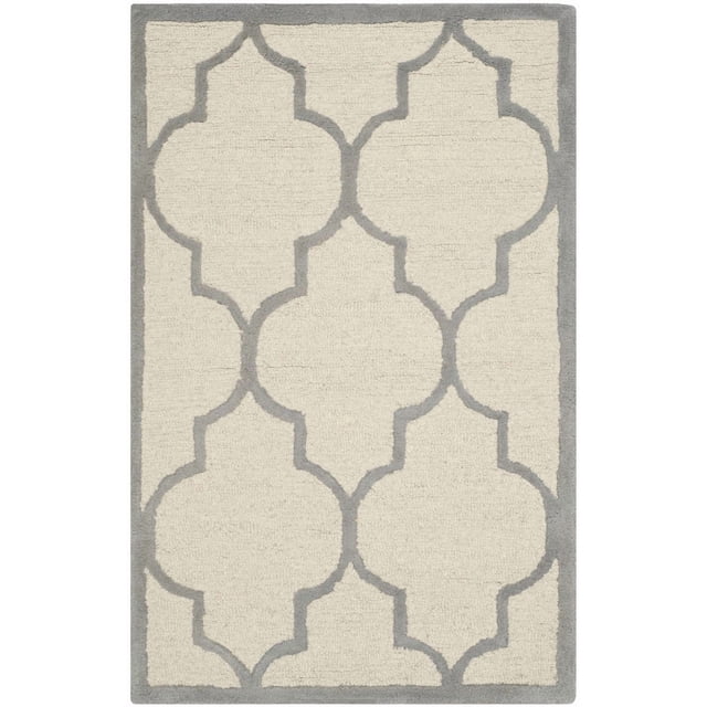 Safavieh Cambridge Kevin Geometric Area Rug with a top-down view, hand-tufted wool construction featuring a cream base and gray geometric trellis pattern with border, ideal for modern home or office accent decor and often used as an accent rug.