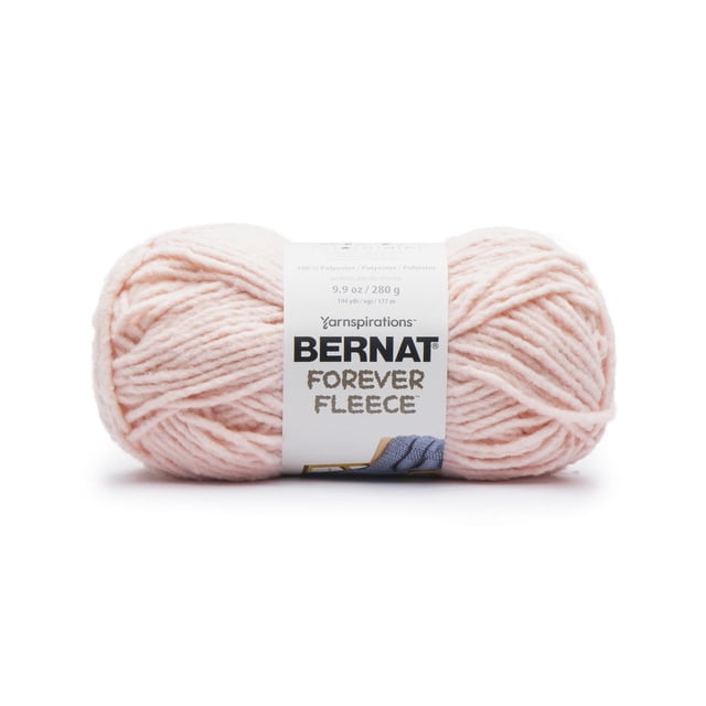 Bernat® Forever Fleece™ Yarn, Polyester #6 Super Bulky, 9.9oz/280g, 194 Yards — front-facing close-up of a single large skein showing brushed fleece texture and rounded super-bulky strand; light gray color, visible Bernat paper label with weight and yardage on a plain white background; often used for cozy home-decor pieces like chunky throws.