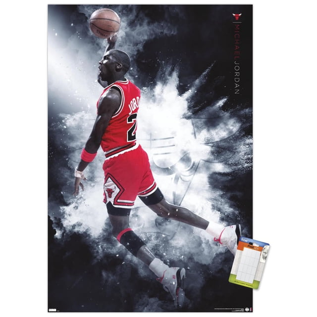 Michael Jordan - Burst Wall Poster, 22.375" x 34", depicting a basketball player in a red Chicago Bulls number 23 jersey mid-air dunking a basketball with a smoky black and white background featuring a faint Chicago Bulls logo, printed on glossy poster paper suitable for wall art and room decoration.