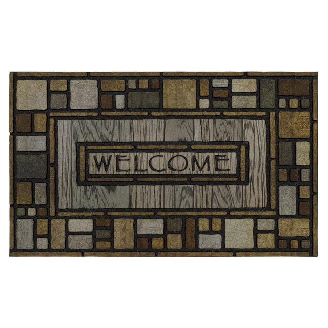Mohawk Home Drifted Nature Polyester Door Mat 1' 6" X 2' 6" with a rectangular shape featuring a central wood-grain panel with 'WELCOME' in block letters, surrounded by a mosaic of rectangles and squares in earth tones of brown, gray, and tan, made from recycled polyester flock and backed by recycled rubber, ideal for indoor and outdoor entryways and suitable as a rustic accent mat.