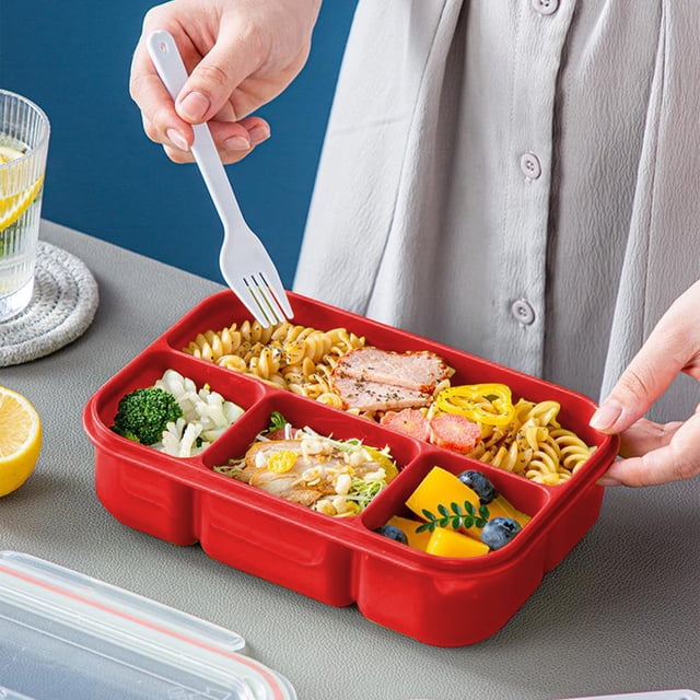 Clearance! Gspmoly 4 Compartments In One Large Lunch Box Leakproof Lunch Box made of food-grade plastic in a vibrant red color. This bento box features four compartments filled with various foods, including pasta, vegetables, and fruits, and comes with a white fork. Suitable for dining out, work, or school, it is microwave-safe, sealed for freshness, and ideal for food storage.