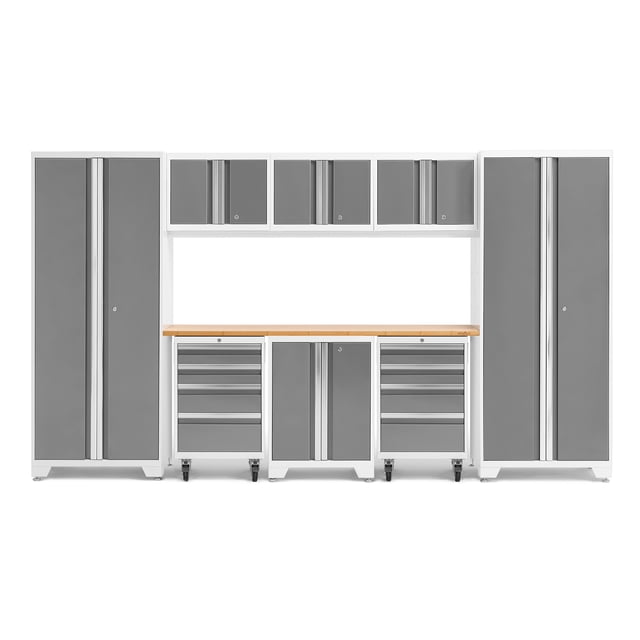 NewAge Products Bold Series Ensemble d'Armoires de 9 Pcs Conçu pour le Rangement et l'Organisation du garage. Comprend une construction en Acier Robuste de Calibre 24 avec Fini Revêtement en Poudre, Incluant Deux Casiers de 30 Pouces, Deux Tiroirs à Outils Roulants avec Roulettes Anti-Basculement Verrouillables, une Armoire de base, Trois Armoires Murales et un Plan de Travail en Bambou de 72 Pouces. Tablettes en Acier Ajustables, Portes Entièrement Verrouillables avec Poignées en Aluminium, et une surface en Bambou Résistante aux Taches Offrant Durabilité et Fonctionnalité. Dimensions : 132 Pouces de Large, 18 Pouces de Profondeur et 72 Pouces
