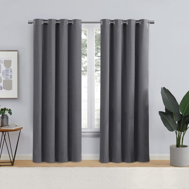 Eclipse Corte 63" Grommet Blackout Window Curtains Panel in grey flannel polyester fabric with metal grommet top, shown hanging on a rod in a front-facing view. These blackout curtains provide light control, total privacy, and noise reduction, ideal for enhancing living spaces with functional style.