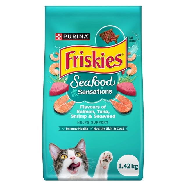 Friskies Ocean Sensations Flavours of Salmon, Tuna, Shrimp & Seaweed dry cat food in a teal 1.42 kg bag with Purina logo, featuring shrimp, salmon, tuna, seaweed images, and a cat licking its lips, supporting immune health and healthy skin and coat.