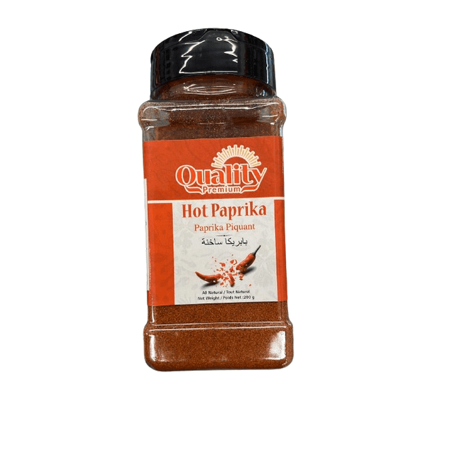 Quality Hot Paprika 200G plastic container with black screw cap, filled with finely ground hot paprika spice. The orange and white label features the Quality Premium logo, chili pepper illustration, and multilingual text including English and Arabic, suitable for adding spicy flavour to recipes.