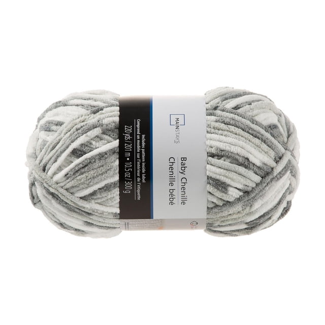 MainStays Cozy Chenille Supreme Baby grey yarn skein with soft chenille texture in grey and white, 220 yards (201 meters) long and 10.5 ounces (300 grams), ideal for knitting baby blankets, clothing, and delicate crafts.