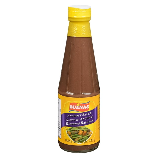 Buenas Bagoong Balayan Anchovy Sauce in a 340g clear glass bottle with a yellow cap and label displaying the brand and product name in English and French, containing fermented anchovies for use in Filipino and Southeast Asian dishes.