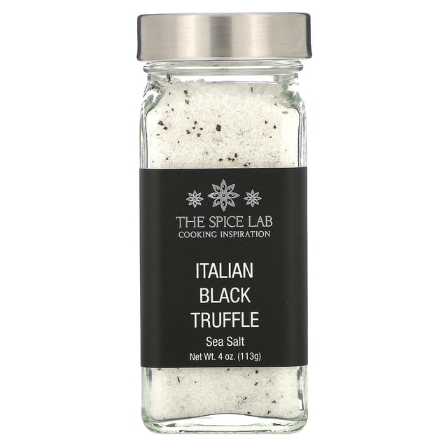 The Spice Lab Italian Black Truffle Sea Salt, 4 oz (113 g), packaged in a clear glass jar with a stainless steel lid. The label features a black background with white text, highlighting its kosher and natural qualities. Infused with black truffle pieces, this sea salt enhances the flavor of beef, eggs, potatoes, and pasta.