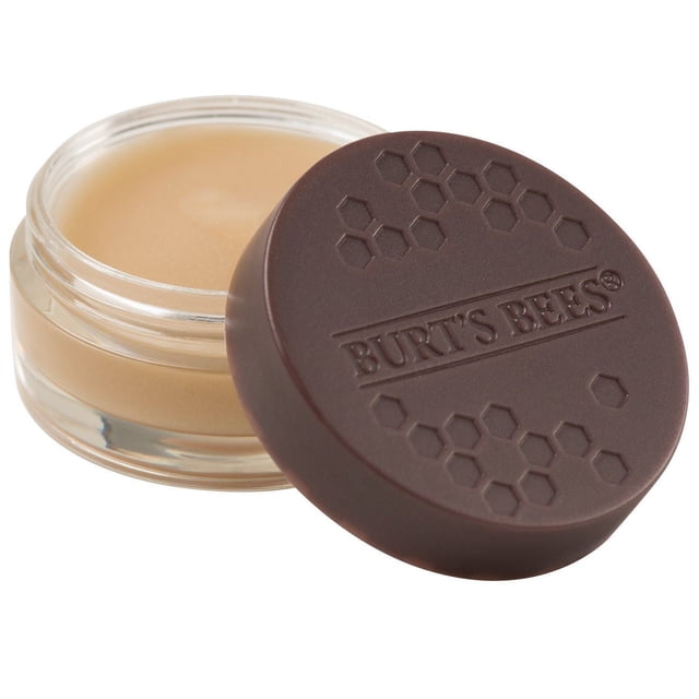 Burt’s Bees® 100% Natural Origin Overnight Intensive Lip Treatment in a clear glass jar with a dark brown lid embossed with honeycomb patterns and the Burt’s Bees logo, showing smooth beige balm that moisturizes and repairs lips overnight, suitable for a natural lip care routine.