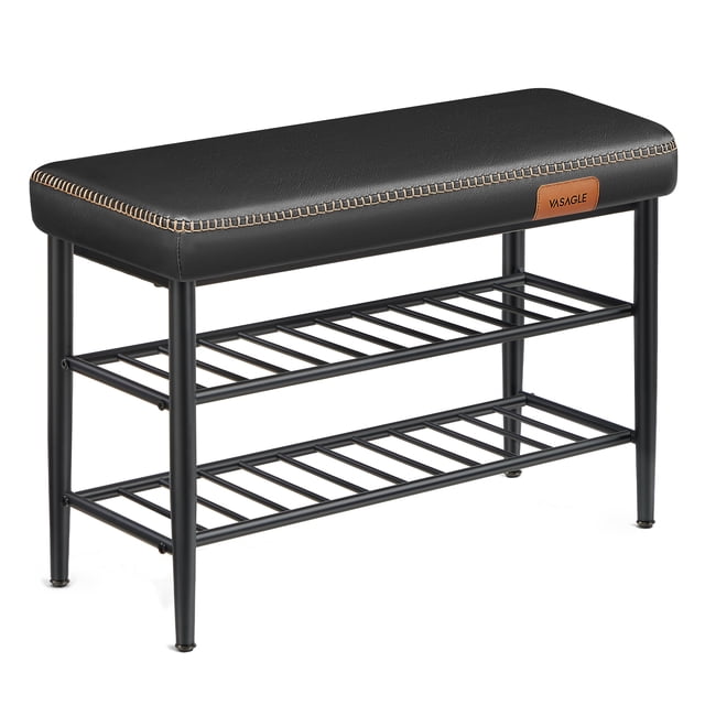VASAGLE EKHO Collection shoe bench in ink black, designed for entryway organization. Features a steel frame with three-tier shoe storage racks and a cushioned seat upholstered in PU leather with refined stitching. The bench measures 11.8 inches deep, 31.5 inches wide, and 19.7 inches high, with a weight capacity of 300 pounds.