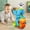 bleu, variante sur Jouet Musical Interactif de Marche avec Tambours, Lumières et Sons pour Enfants / Jouet Mollet pour Tout-Petits Qui Secoue, Tourne et Joue de la Musique / Jouet de Voiture pour Bébé à Tambour avec Lumières DEL Colorées