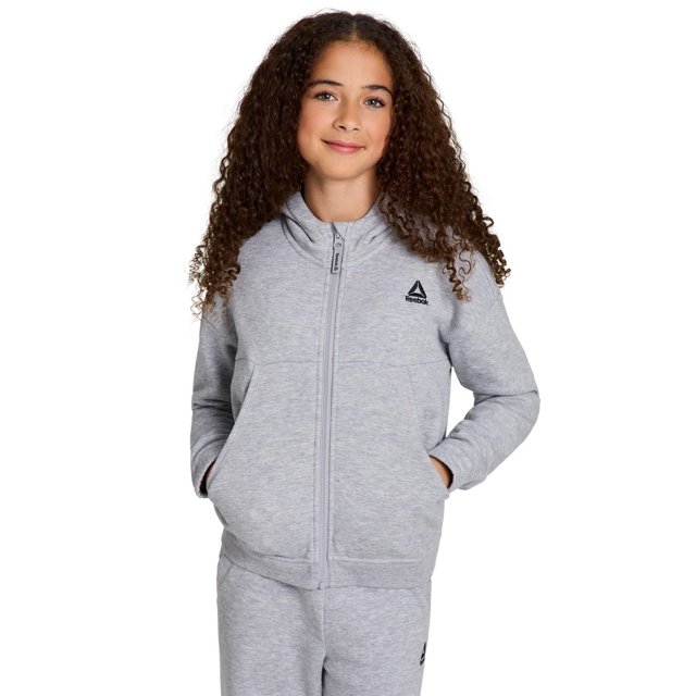 Chandail à Capuchon à Fermeture Éclair Complète pour Filles Reebok Encore en Molleton Mélange de Coton Gris à Coupe Décontractée, avec Fermeture Éclair Complète à l'Avant, Poche Kangourou et logo Reebok Brodé sur la Poitrine Gauche, Assorti à un Pantalon de Survêtement Gris Assorti, Convient aux Tenues Décontractées et aux Activités.