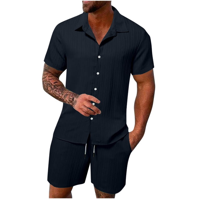 UVEASISHA Men's 2 piece Matching Set Textured Summer Beach Outfit in navy, featuring a breathable button-down shirt with short sleeves and matching shorts. The shirt has a relaxed fit with a button closure, while the shorts include an elastic waistband with drawstrings and side pockets. Made from lightweight, soft, and breathable fabric, this set is ideal for summer activities such as beach outings, casual gatherings, or lounging. Available in size M.