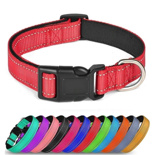 Reflective Dog Collar Soft Neoprene Padded Breathable Nylon Pet Collar Adjustable for Small Medium Large Extra Large Dogs. The image shows a red nylon dog collar with reflective stitching, a padded neoprene lining, and a black quick-release ABS buckle. A metal D-ring is attached for leash or tag connection. Below, additional collars in various colours, including blue, pink, black, and green, are displayed. Suitable for dogs with neck sizes between 14 and 28 inches.