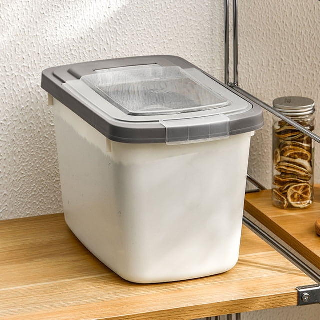 JMYHOAM Storage Bags Large Airtight Rice Container, a white food storage container with a grey flip-up lid and transparent window, designed for storing rice, cereal, pet food, or flour. Measuring 35x22x20cm, it is lightweight, reusable, and easy to clean. Shown on a wooden shelf in a kitchen setting.