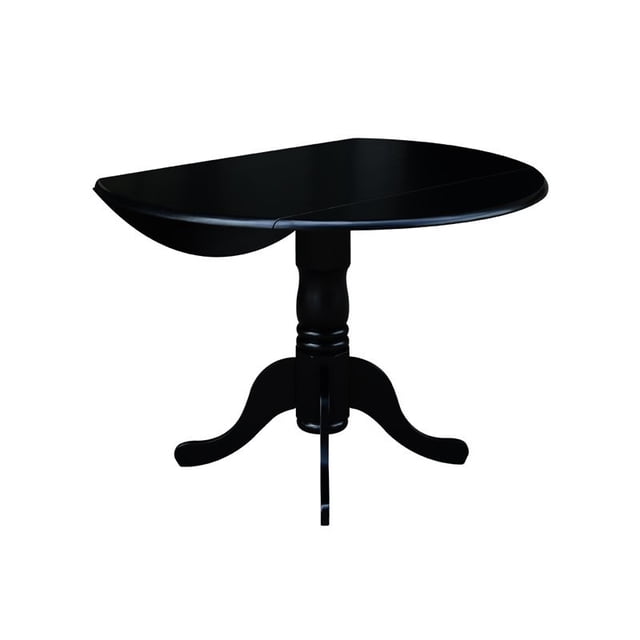 International Concepts Table à Manger Ronde de 42 Pouces à Double Abattant en Noir avec base Piédestal et Dessus en Bois à Bord Biseauté. Cette Table à Manger de Hauteur standard Présente un style Traditionnel et Deux Abattants pour une Utilisation flexible dans les Espaces de Repas Décontractés. Montrée avec un Abattant Allongé, Elle Est Idéale pour les Cuisines Compactes Ou les Coins-Déjeuners, Offrant une Finition Noire Polyvalente et Élégante.