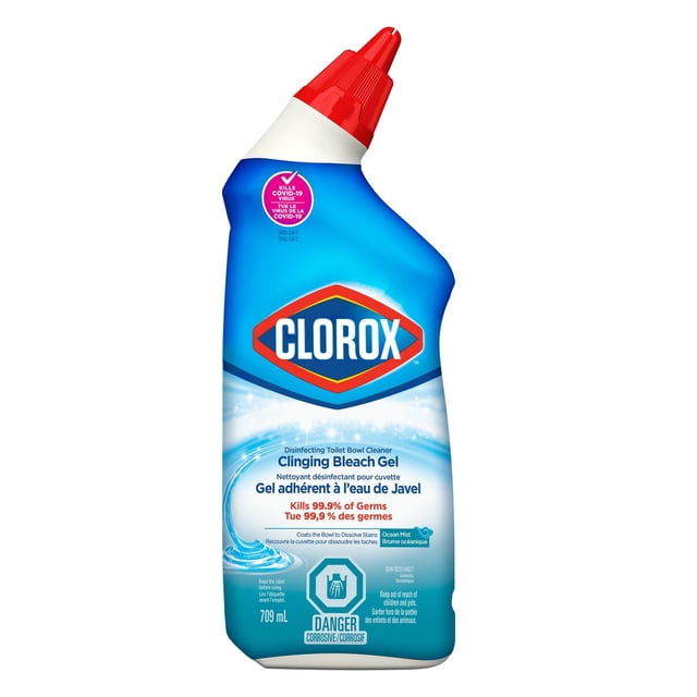 Clorox Toilet Bowl Cleaner, Clinging Gel with Bleach, 709 mL bottle with red angled nozzle and Ocean Mist scent. This bathroom cleaner disinfects and kills 99.9% of germs, clings to toilet bowls to dissolve stains, and brightens surfaces. Warning label indicates corrosive contents.