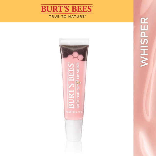 Burt’s Bees® 100% Natural Origin Lip Shine in Whisper, a 14g tube of sheer neutral pink lip gloss with a honeycomb pattern on the dark cap, enriched with apricot and sunflower oils to moisturize and add natural shine, ideal for layering over lipsticks or worn alone.