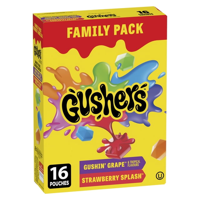Fruit Gushers by Betty Crocker Gluten Free Variety Pack family pack containing 16 pouches of gluten free fruit snacks in Gushin' Grape and Strawberry Splash tropical flavors, displayed in a bright yellow box with colorful juice splash graphics.