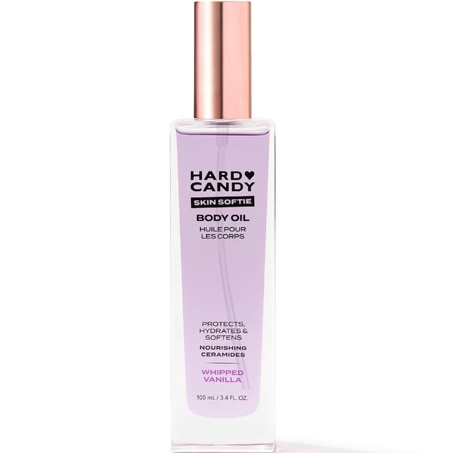 Hard Candy Nourishing Body Oil Whipped Vanilla in a clear rectangular bottle with a light purple label and rose gold pump, moisturizing body care oil with nourishing ceramides, hydrating and softening skin, 100 mL.
