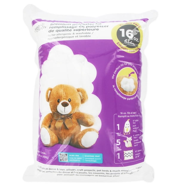 Premium Polyester Fill 16oz (454g) vacuum-sealed pack with white soft polyester stuffing behind a brown teddy bear image on purple and white packaging, suitable for sewing fills, craft projects, pillows, and pet beds, hypoallergenic and washable.