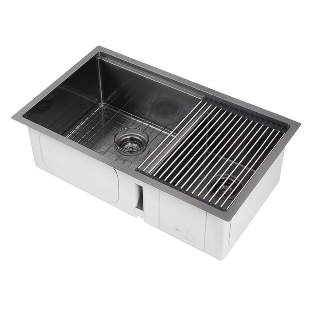 Ancona 32” 60/40 Double Bowl Undermount Kitchen Sink with Grid and Roll-Up Mat, ideal for kitchen renovation projects. Handcrafted from 18-gauge stainless steel with a durable black PVD Nano finish, it features two deep bowls with a 60/40 split design, protective grids, and a roll-up drying mat. Includes QuietGuard™ noise absorption and rear-drain positioning for enhanced under-cabinet storage.