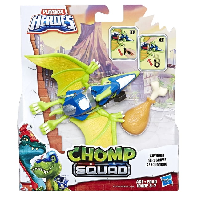 Playskool Heroes Chomp Squad Skyhook action figure with green wings and blue body, featuring removable gear and a retractable hook holding a chicken leg accessory, displayed in dinosaur-themed packaging for ages 3 to 7.