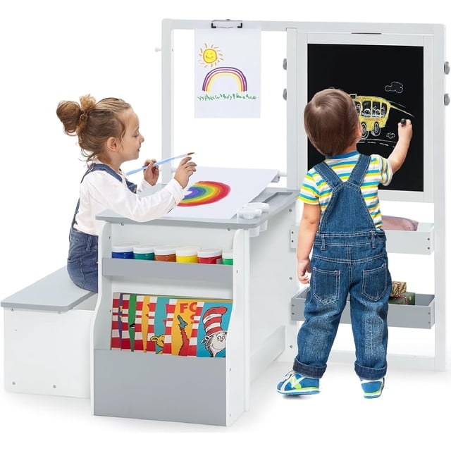 OLAKIDS 3 in 1 Kids Art Table and Chair Set, a grey wooden activity desk with a double-sided easel featuring a blackboard and whiteboard. Includes a bench, storage compartments, a paper roll, paint buckets, and art supplies. Two children are using the set, one drawing on the blackboard and the other painting on the desk. Perfect for kids' furniture in playrooms, nurseries, or daycare settings.