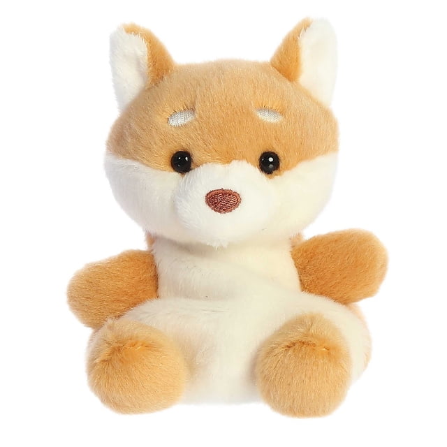 Aurora Palm Pals - Keiko Shiba Inu (Dog) 5-inch plush toy with a tan and white design, soft and fluffy texture, and bean pellets for stability. This stuffed animal is a perfect plush companion with perked ears and a friendly expression, suitable for all ages.