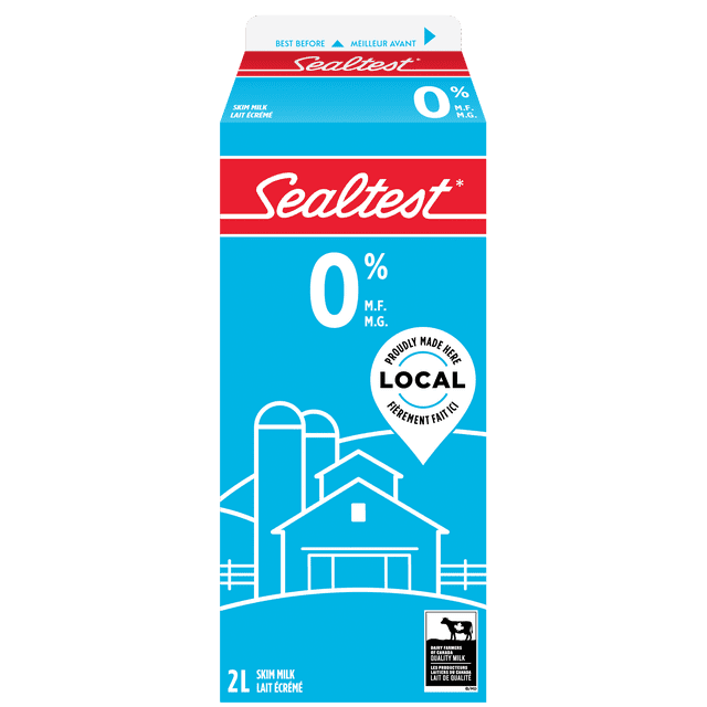 Sealtest Skim 0% Milk carton in blue and red with white text, featuring a farm illustration, local production badge, and Dairy Farmers of Canada quality milk logo, 2L size, labeled in English and French, highlighting it as a source of calcium and vitamin D.