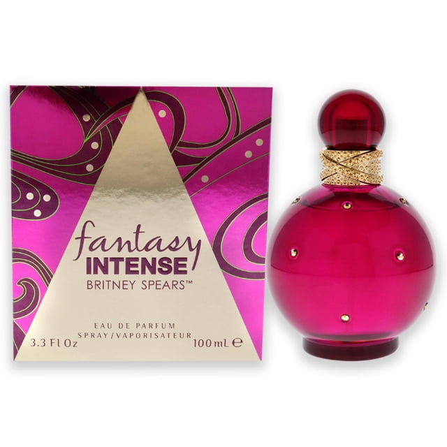 Fantasy Intense by Britney Spears for Women - 3.3 oz EDP Spray. A floral fruity gourmand fragrance launched in 2021, featuring a refreshing and oriental scent. The image shows a vibrant pink spherical bottle with gold accents alongside its matching pink and gold packaging.