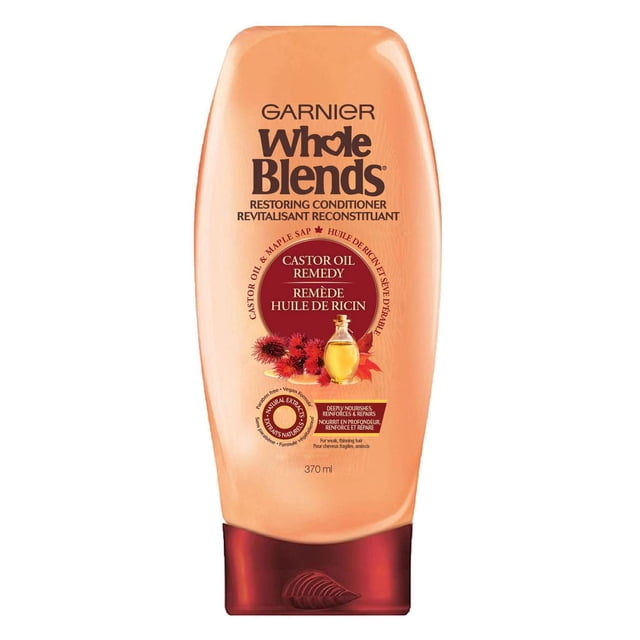 Garnier Whole Blends Huile de Ricin Revitalisant Remède à l'Huile de Ricin Bouteille de 370 ml avec Corps beige et Bouchon Rabattable Rouge Foncé, Formulé pour Restaurer les Cheveux Faibles et Clairsemés avec Huile de Ricin Nourrissante et Sève d'Érable Qui Nourrit en Profondeur et Répare pour une Douceur Pelucheuse.