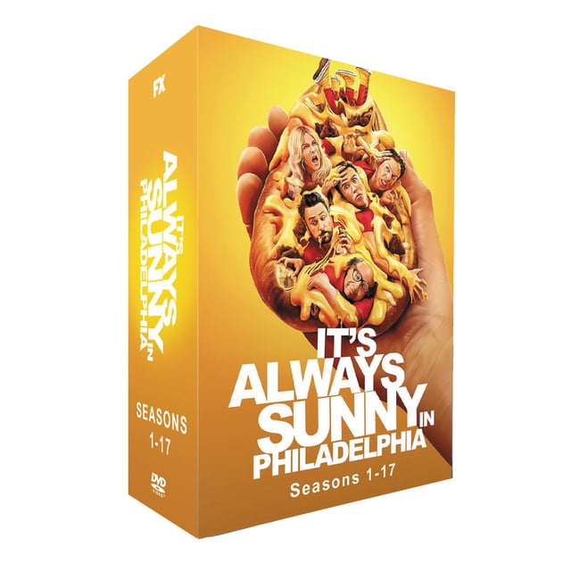 Il Fait Toujours Ensoleillé à Philadelphia Saisons 1-17 Coffret DVD Présentant une Couverture Jaune Vibrante avec un design de Tranche de pizza Tenant une Main. le Titre et les Détails de la Saison Sont Affichés de Façon Prééminente en Texte Blanc Audacieux, Idéal pour les fans de Séries Comiques Télévisées.
