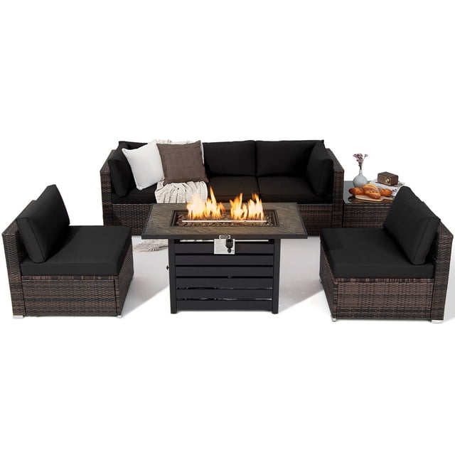 Gymax 7PCS Patio Rattan Furniture Set with a 42-inch fire pit table and black cushioned seating. The set includes a mix brown PE rattan frame, tempered glass coffee table, two corner sofas, three armless sofas, and cushions for added comfort. The fire pit table features a 50,000 BTU heat output, adjustable flame, and CSA certification for safety. Designed for outdoor use with durable materials and a contemporary style.