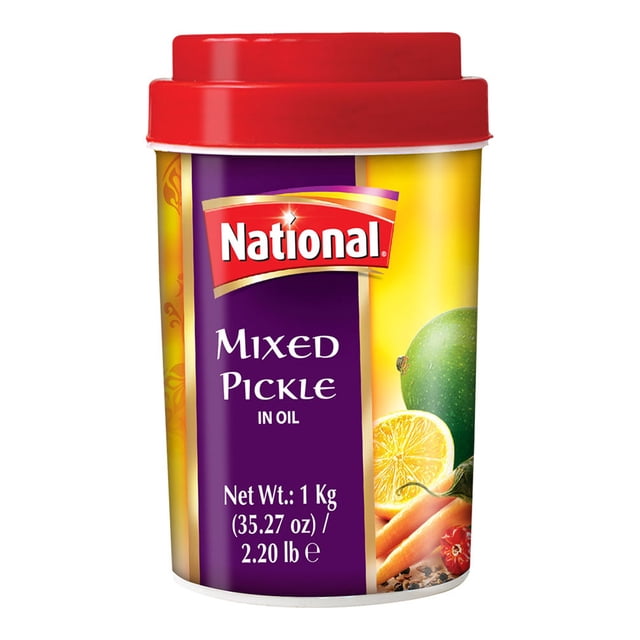 MIXED PICKLE in oil by National in a 1 kg plastic jar with a red lid, labeled purple and yellow with images of mango, lemon, carrots, and spices, serving as a spicy, tangy condiment to enhance everyday meals.