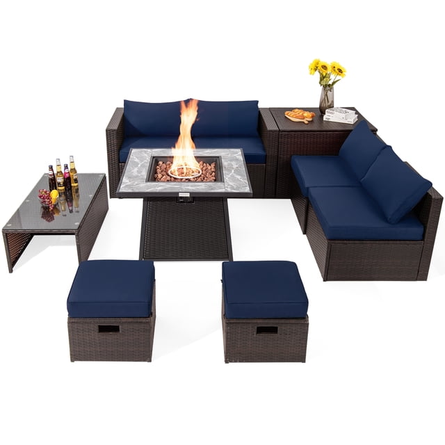 Patiojoy Ensemble de Mobilier de Patio Extérieur de 9 Pcs avec une table de Foyer au propane de 35 Pouces Comprenant un Dessus de table en Céramique à Motif Marbre, des Canapés Sectionnels en Osier PE à Coussins Bleu Marine, des ottomans et une table Basse en Verre Trempé. Conçu pour un Rangement Peu Encombrant et Comprend une Boîte de Rangement et des Housses Imperméables pour la protection Extérieure.