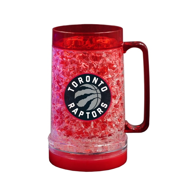 The Sports Vault Light Up Freezer Mug Toronto Raptors features double-wall plastic with freezable crystal-gel insulation to keep drinks cold, a red handle and base, printed team logo, and removable LED bottom with three light modes, suitable for freezer safe drinkware.