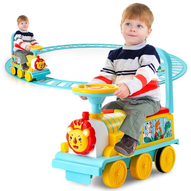 Gymax Train Électrique 6 V pour Enfants Ride On, Jouet de Train Motorisé Bleu au design vibrant Présentant un Visage de lion à l'Avant et des Autocollants Colorés à Thème Animal sur les Côtés. le Train Comprend six Roues avec Bandes Antidérapantes et un Volant avec Boutons de Musique et de Lumière. un Enfant Est Assis dans le Train, Qui Est Placé sur une Voie Circulaire Formée de 16 Pcs Courbées, Formant un Diamètre de 7,2 Pi. le Train Comprend Aussi des Pédales Rétractables, un Dossier et un Rangement sous le Siège pour Jouets Ou Collations.