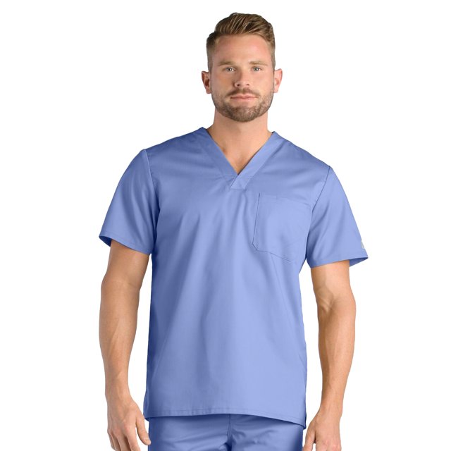 Meavn EON Men's One Chest Pocket V-Neck Scrub Top in a solid light blue color, featuring short sleeves and a single chest pocket. Ideal for men's scrubs and workwear uniforms, the top has a relaxed fit and a professional appearance.
