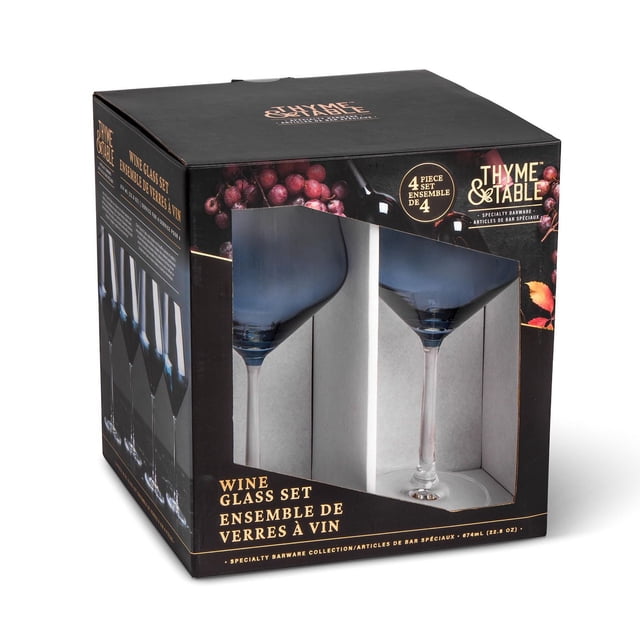 Thyme & Table Wine Glasses, 23oz, 4-Piece Set in black specialty barware packaging with a clear window showing two clear, long-stemmed wine glasses with wide bowls, suitable for various wines, featuring grapevine design on the box.
