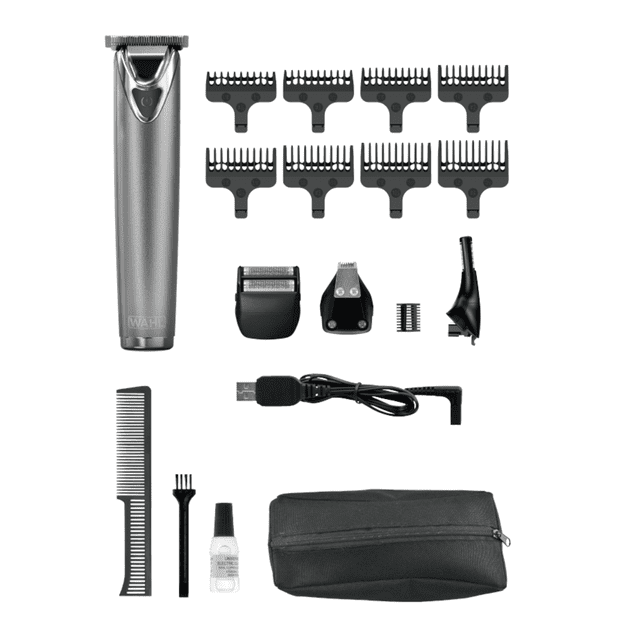 Wahl Lithium-Ion Stainless Steel Trimmer grooming kit with silver trimmer featuring T-blade, eight black adjustable guide combs for precise beard grooming, dual shaver head, ear and nose trimmer, cleaning brush, USB charging cable, black comb, lubricating oil, and black zippered pouch on white background.
