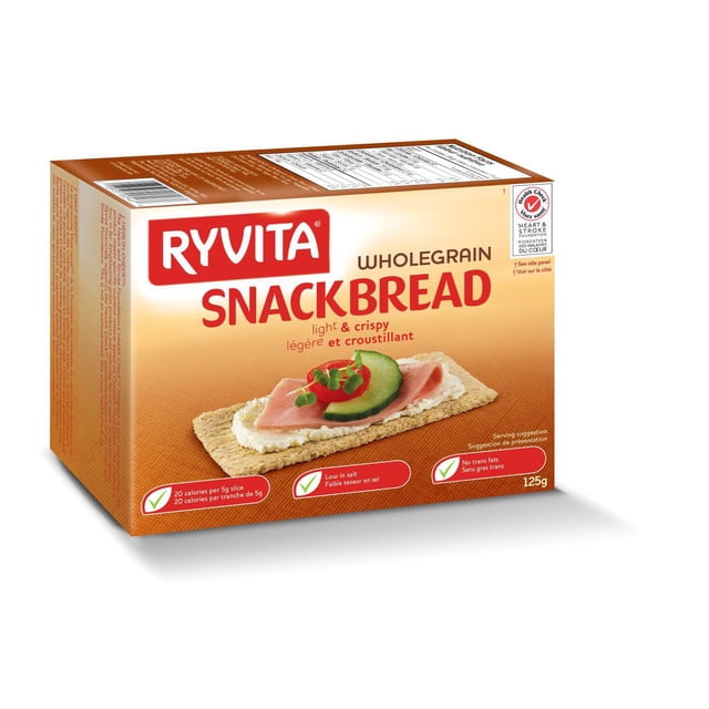 E-RYVITA RYVITA MGRAIN SNKBRD wholegrain crackerbread snack bread box in a 3/4 front view with beige and orange gradient background, showing a rectangular wholegrain cracker topped with cream cheese, ham, cucumber, and red pepper slice with microgreens, highlighting its light, crispy texture, low salt, no trans fats, and 125g weight, often used as a versatile snack option.
