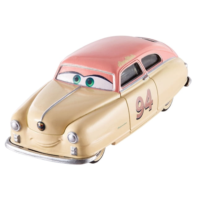 Disney/Pixar Cars 3 Louise Barnstormer Nash Die-Cast Vehicle, a 1:55 scale toy car with beige body and pink roof, green eyes on the windshield, number 94 on the door, and silver trim on bumper and hood, suitable for expanding toy car collections.
