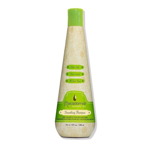 Smoothing Shampoo by Macadamia Natural Oil in a beige bottle with floral patterns and a green cap, designed for daily use to control frizz, safe for color-treated hair, and suitable for all hair types, containing 10 fl oz (300 ml).