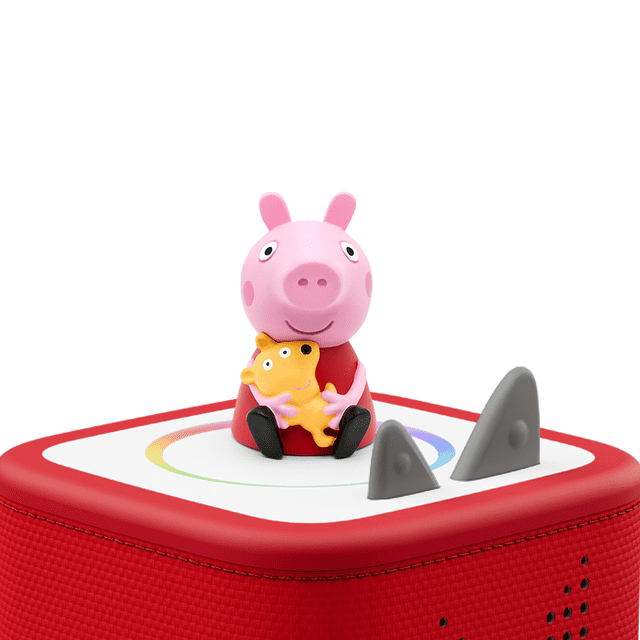 Tonies Personnage Audio - Peppa Pig avec une Figurine Peppa Pig Rose Tenant un Ourson Jaune, Assis sur un Lecteur Audio Toniebox Rouge et Blanc avec des Côtés en Tissu Texturé et Deux Boutons de Commande Triangulaires Gris, Conçu pour un Jeu Éducatif Sans Écran pour les Enfants de 3 Ans et Plus.