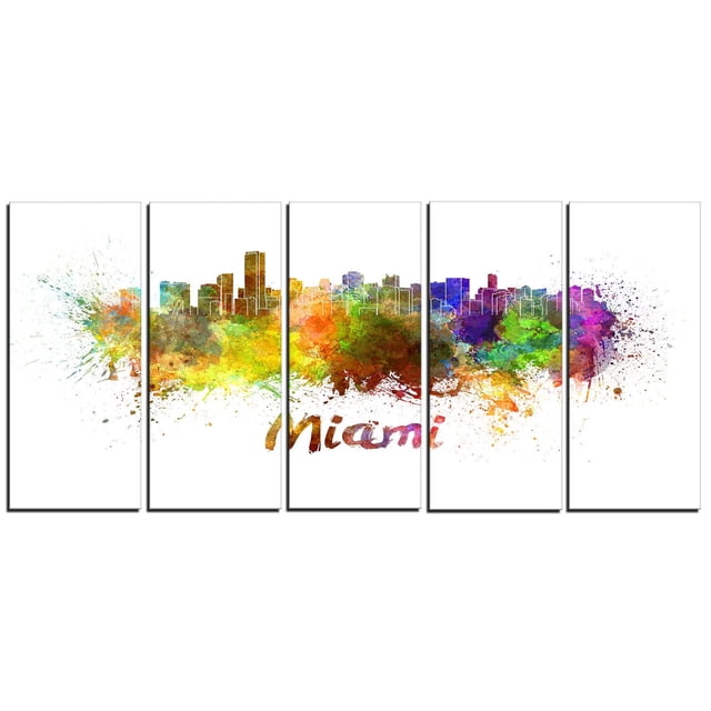 Design Art Miami Skyline Canvas Print featuring a five-panel gallery wrapped cotton canvas with vibrant watercolor splashes in green, yellow, orange, purple, and blue forming Miami's skyline in white outlines above the multicolored 'Miami' text, ready to hang with included hardware, suitable for enhancing home or office décor.
