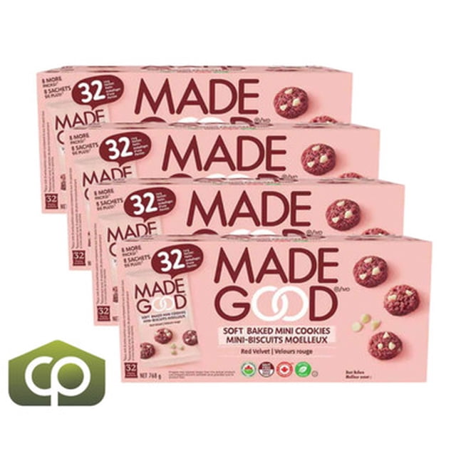 MadeGood Red Velvet Soft Party Treat Baked Mini Cookies, 32 × 24 g (4/Case). A front-facing view of four pink boxes, each containing 32 packs of red velvet soft baked mini cookies. The packaging highlights key features such as nut-free, organic, gluten-free, and made in Canada. The cookies are enriched with nutrients from vegetables and contain only 7 grams of sugar, making them a healthy and indulgent snack option.