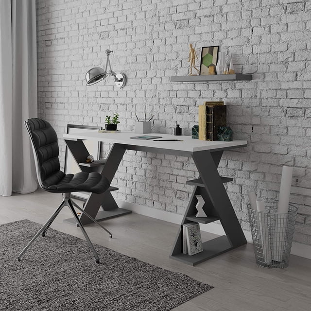 JV Home Papillon Collection 55 inch office desk in dark grey and white, designed as a modern computer desk with sloping angles and integrated storage. The desk features six shelves for organizing books, files, and decor, and a spacious 140x60 cm surface ideal for laptops, writing, or workstations. Positioned in a contemporary home office setting with a brick wall backdrop and minimalist decor.